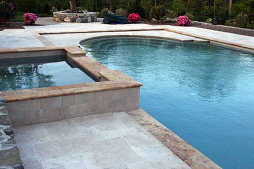 Travertine Spa, and Deck. Pool Fitted for Automatic Cover by New View